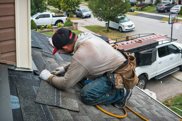 Professional Roofing technician working in Lakeville, NY